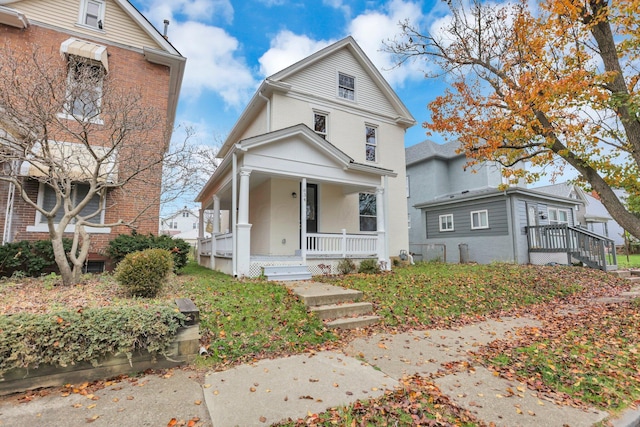 view of property with a porch