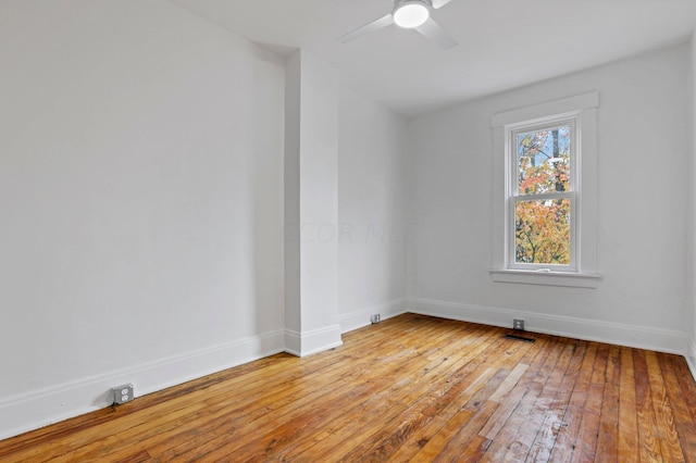 empty room featuring light hardwood / wood-style floors and ceiling fan