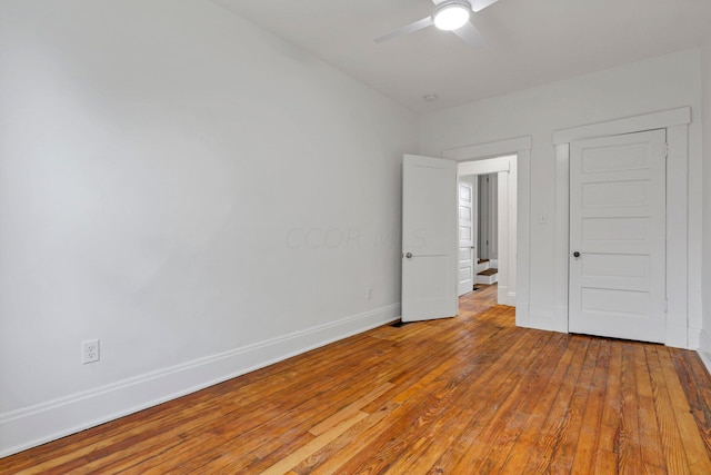 unfurnished bedroom with light hardwood / wood-style flooring and ceiling fan