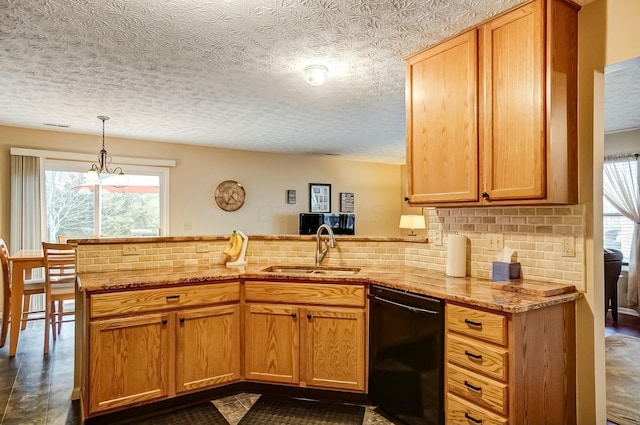 kitchen with decorative backsplash, dishwasher, light stone counters, a peninsula, and a sink