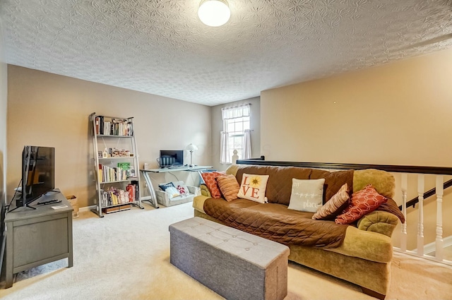 living room with a textured ceiling, carpet floors, and baseboards