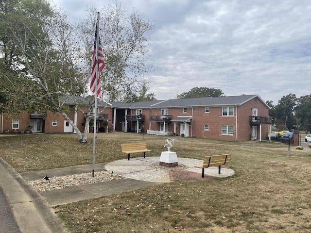 view of community featuring a lawn