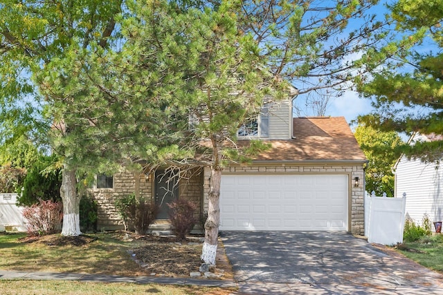 view of front of property featuring a garage