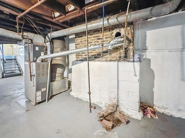 basement featuring heating unit