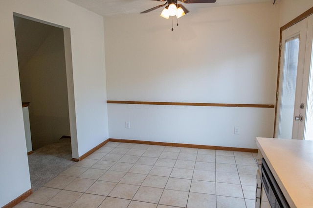 unfurnished room with ceiling fan and light colored carpet