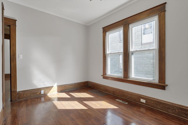 empty room featuring hardwood / wood-style floors