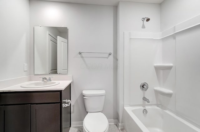 full bath with vanity, toilet, washtub / shower combination, and baseboards