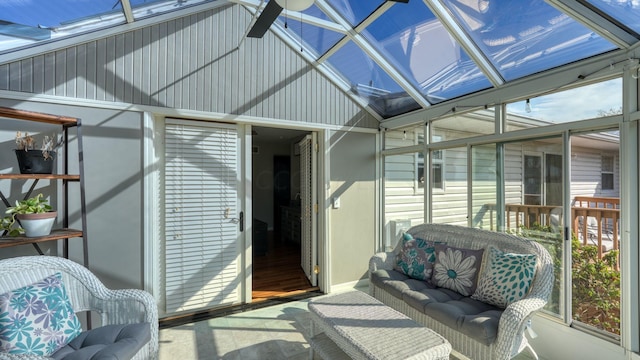 sunroom with ceiling fan and a wealth of natural light