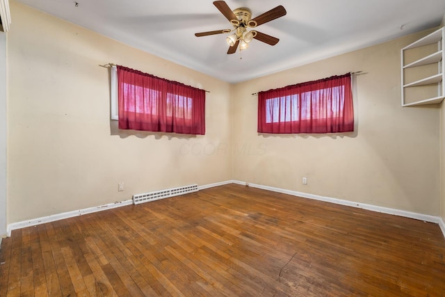 unfurnished room featuring ceiling fan and hardwood / wood-style flooring