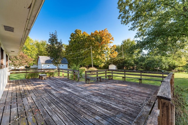 deck featuring a storage unit