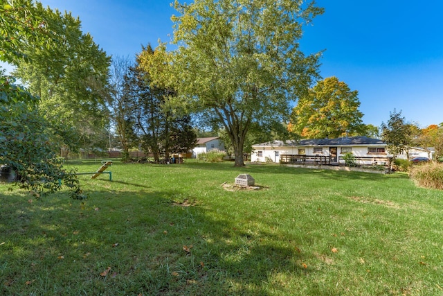 view of yard with a deck