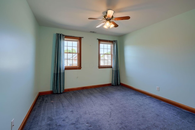 unfurnished room with carpet and ceiling fan