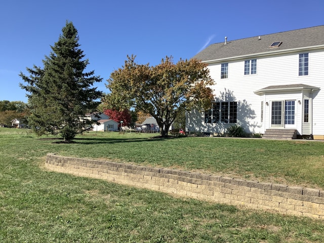 exterior space featuring a yard