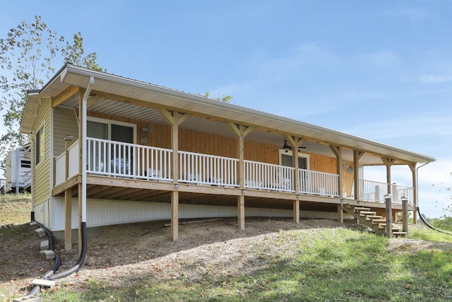 back of house featuring ceiling fan