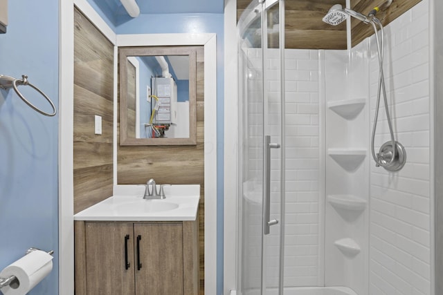 bathroom with a shower and vanity