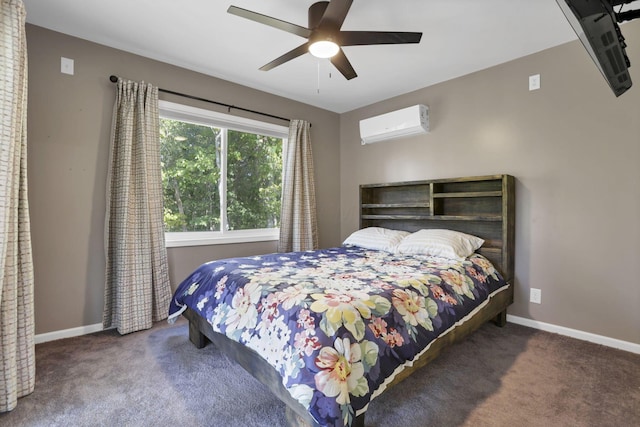 bedroom with dark carpet, a wall unit AC, and ceiling fan