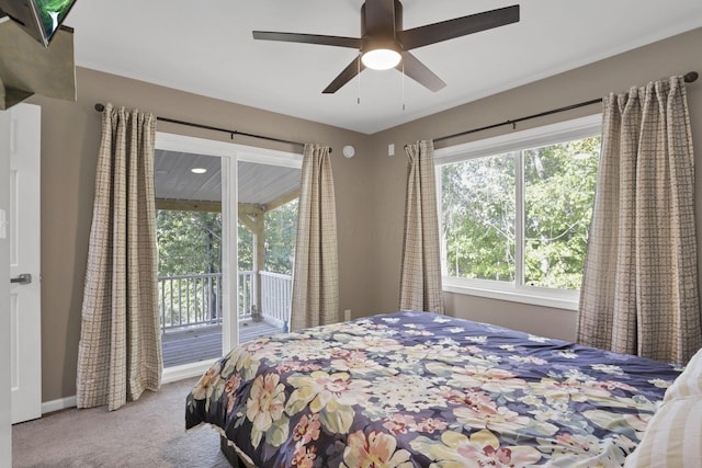 bedroom featuring ceiling fan, access to exterior, and light carpet