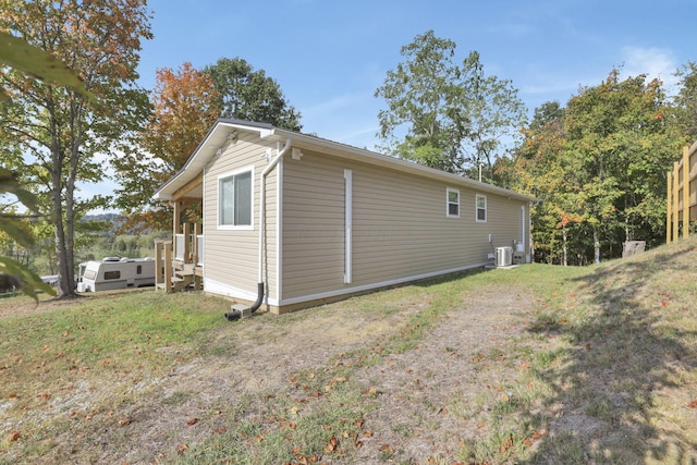 view of property exterior with cooling unit