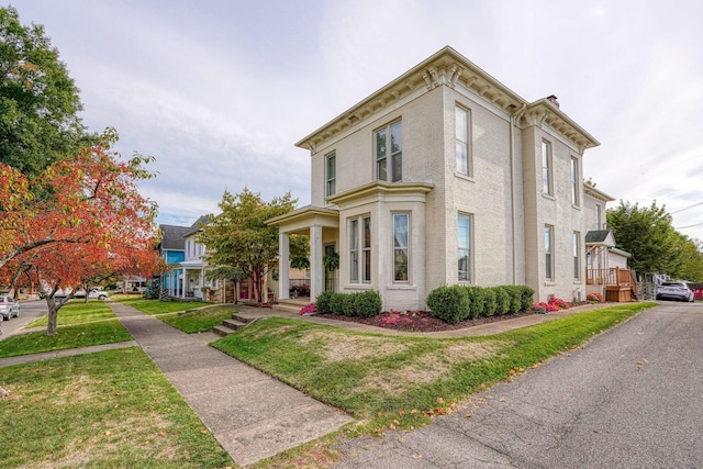 view of front of home with a front yard