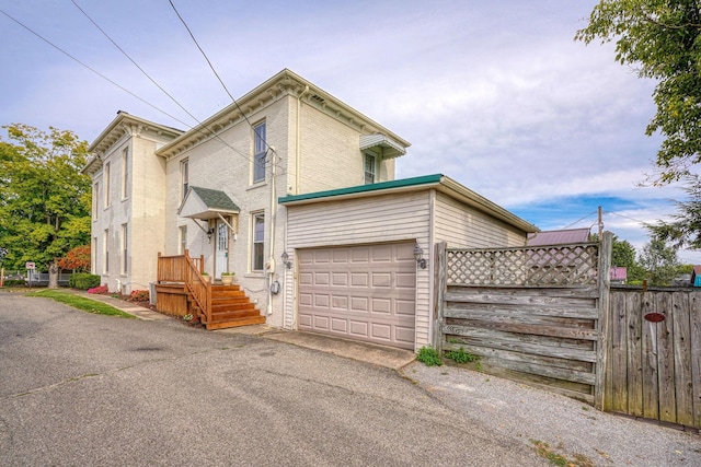 view of front of home with a garage