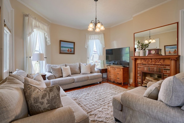 living room with plenty of natural light, ornamental molding, and a notable chandelier