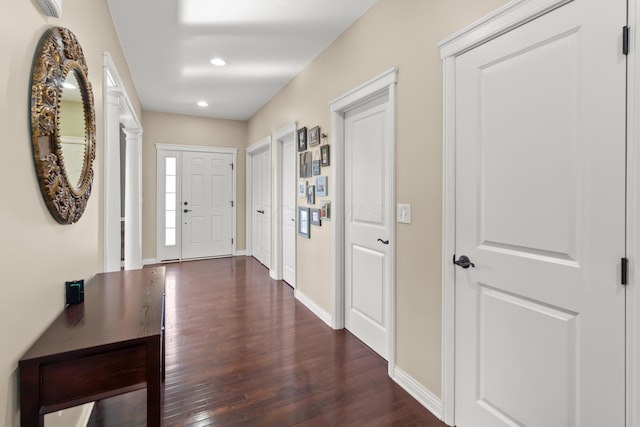 entrance foyer with dark hardwood / wood-style floors