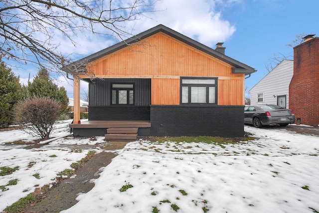 view of snow covered property