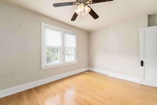 unfurnished room featuring ceiling fan and light wood-type flooring