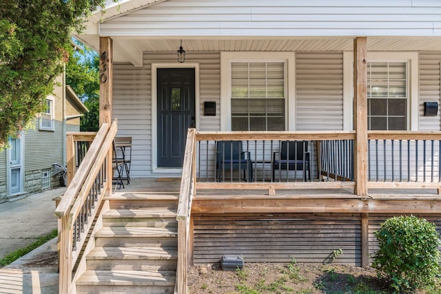 doorway to property with covered porch