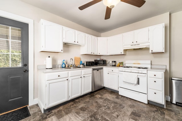 kitchen with white cabinets, ceiling fan, sink, and stainless steel appliances