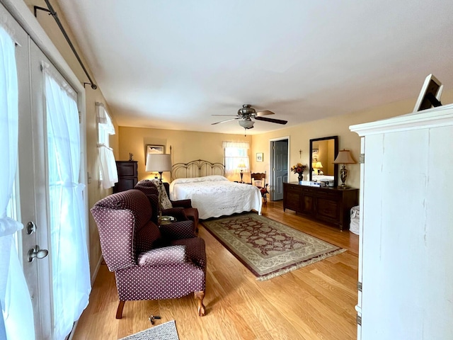 bedroom featuring light hardwood / wood-style flooring and ceiling fan