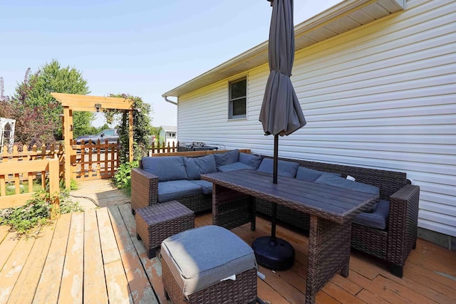 wooden deck with outdoor lounge area