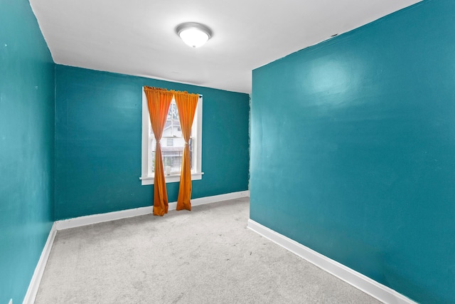 empty room with carpet flooring