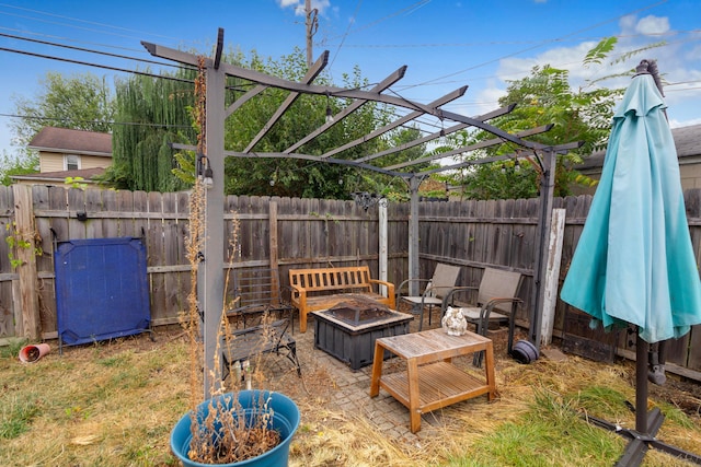 view of patio with a pergola and an outdoor fire pit