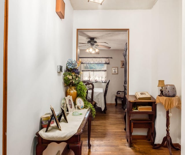 hall with dark hardwood / wood-style flooring