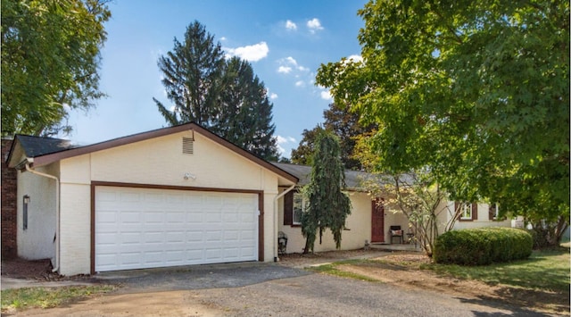 ranch-style house with a garage