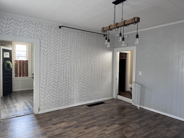 unfurnished room with dark hardwood / wood-style floors and crown molding