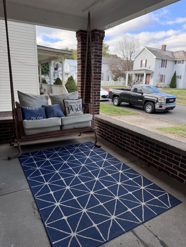 view of patio featuring covered porch