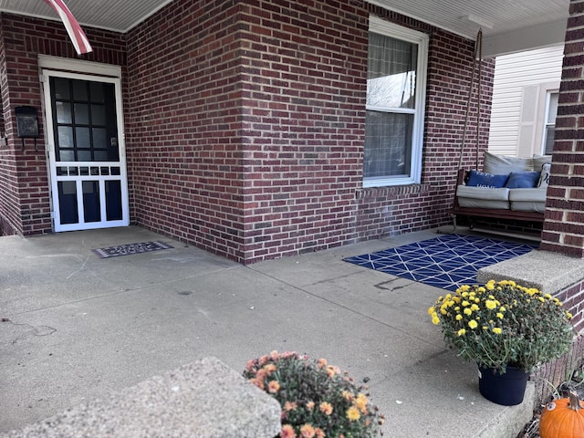 property entrance featuring covered porch