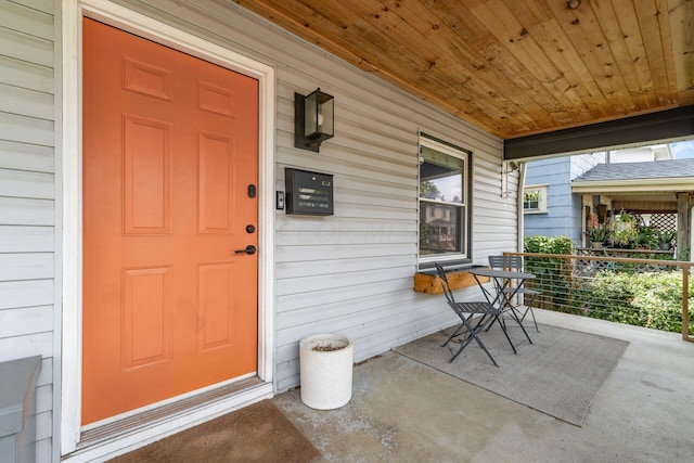 entrance to property with a porch