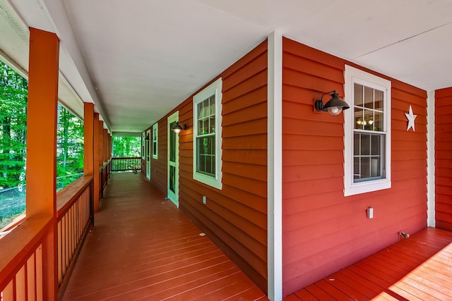 view of property exterior with covered porch