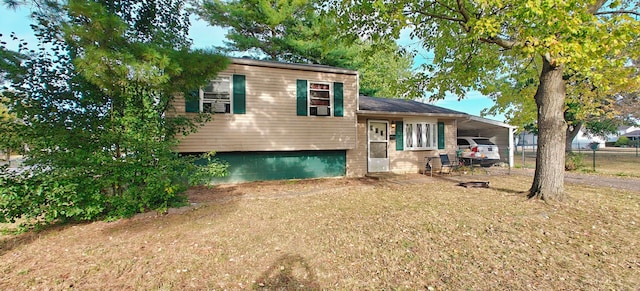 split level home with a carport