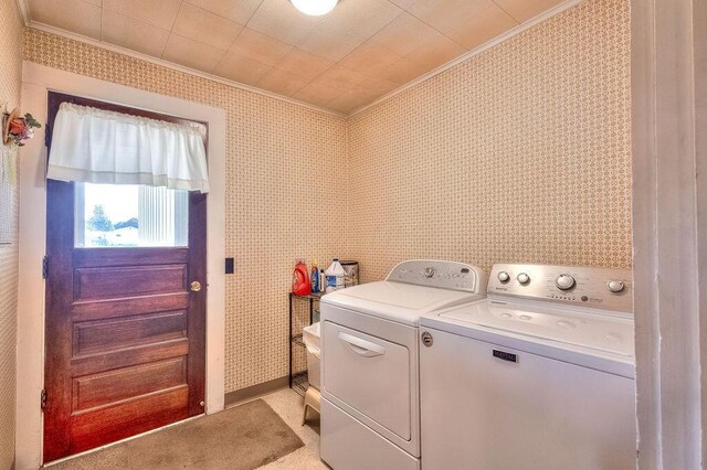 702 Coshocton Ave, Mount Vernon, OH 43050 - washroom with crown molding and washer and clothes dryer
