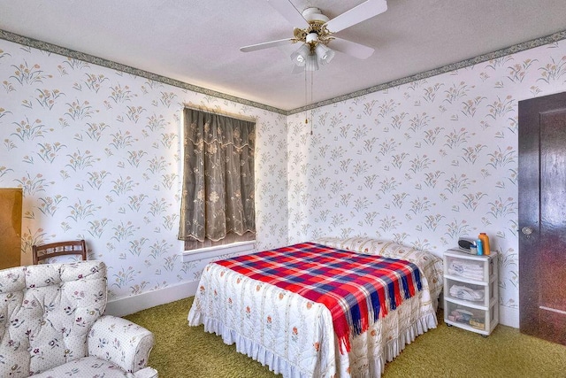 702 Coshocton Ave, Mount Vernon, OH 43050 - bedroom with carpet, wallpapered walls, and a ceiling fan