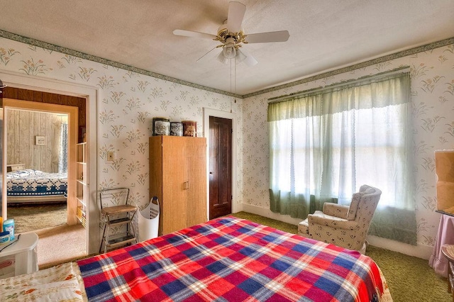 702 Coshocton Ave, Mount Vernon, OH 43050 - bedroom featuring carpet flooring, wallpapered walls, and ceiling fan