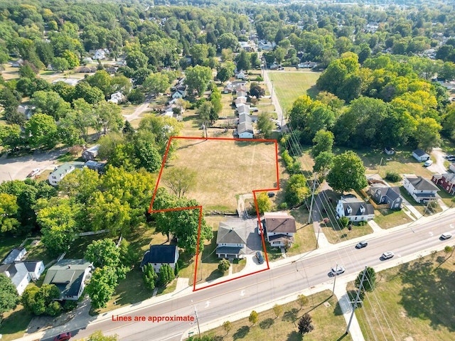 702 Coshocton Ave, Mount Vernon, OH 43050 - aerial perspective of suburban area featuring property parcel outlined