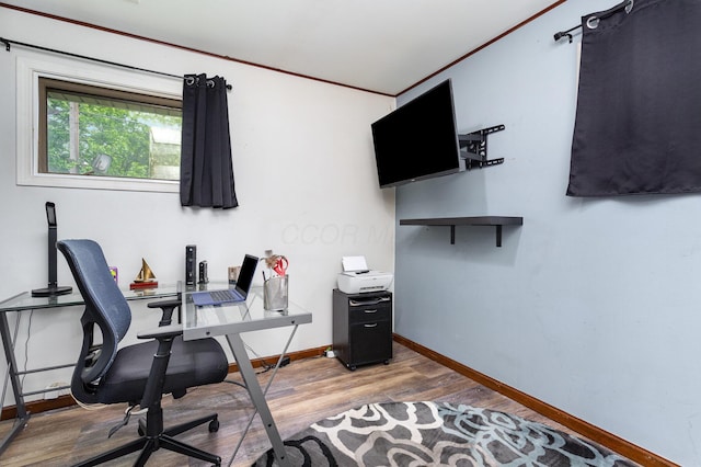 3611 Gerbert Rd, Columbus, OH 43224 - home office with light wood-style floors, baseboards, and crown molding
