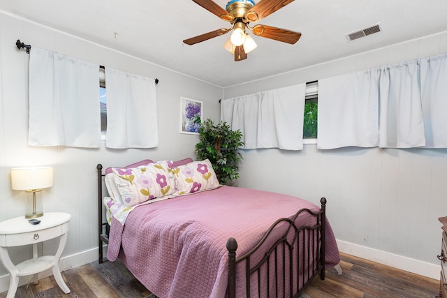 3611 Gerbert Rd, Columbus, OH 43224 - bedroom with wood finished floors, baseboards, a ceiling fan, and crown molding