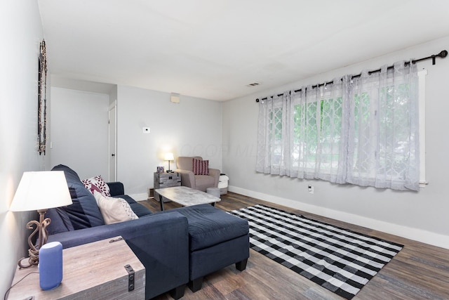 3611 Gerbert Rd, Columbus, OH 43224 - living area featuring baseboards and wood finished floors