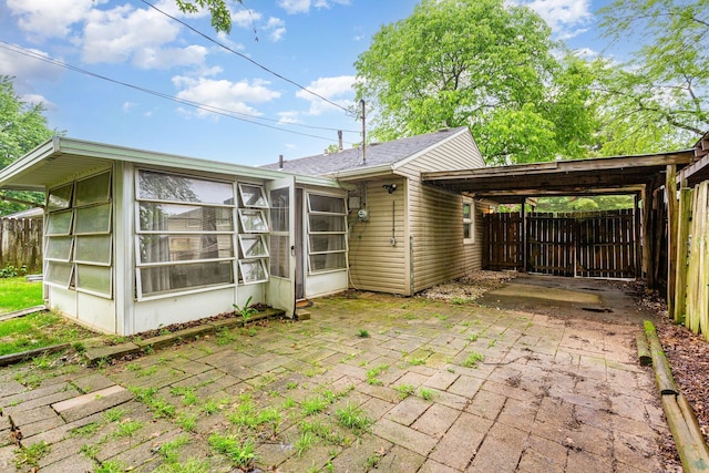 3611 Gerbert Rd, Columbus, OH 43224 - rear view of property with a sunroom